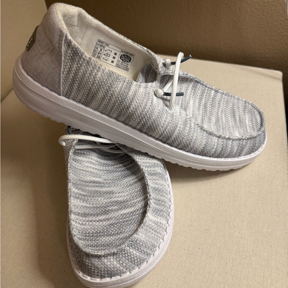 Hey dude, women’s size 10
White and Grey